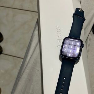 This is the Apple Watch series 7 , 45mm with blue aluminum case sports band.